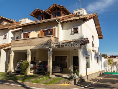 Casa em Condomínio 3 dorms à venda Avenida Eduardo Prado, Cavalhada - Porto Alegre