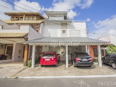 Casa em Condomínio 4 dorms à venda Avenida Juca Batista, Cavalhada - Porto Alegre