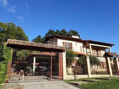 Casa 4 dorms à venda Rua Santa Rita de Cassia, Jardim Krahe - Viamão