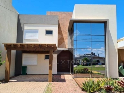 Casa em condomínio fechado com 4 quartos à venda na central, 1100, centro, xangri-lá por r$ 1.300.000