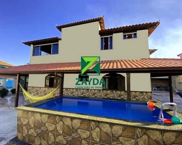 Casa de praia com piscina em amplo terreno, no Bairro Jardim Campomar, em Rio das Ostras