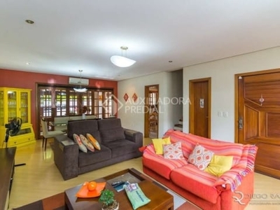Casa em condomínio fechado com 3 quartos à venda na rua jacundá, 625, guarujá, porto alegre, 180 m2 por r$ 640.000