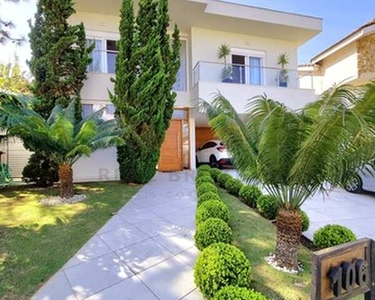 Casa localizada na Aldeia da Serra, Morada dos Lagos, moderna e clean, 4 suítes, 483m² de