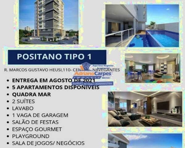 Adriano Carpes imóveis vende apartamento 2 suítes na praia central em Navegantes, SC