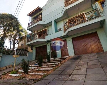 Casa com 3 dormitórios à venda, 208 m² por R$ 549.900,00 - Alto Petrópolis - Porto Alegre