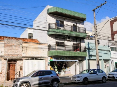 Apartamento com 1 dormitório para alugar, 56 m² por R$ 1.189,98/mês - Centro - Pelotas/RS