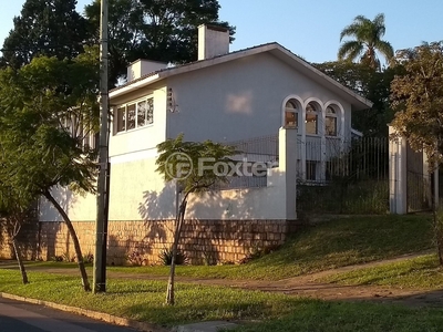 Casa 3 dorms à venda Avenida General Barreto Viana, Chácara das Pedras - Porto Alegre