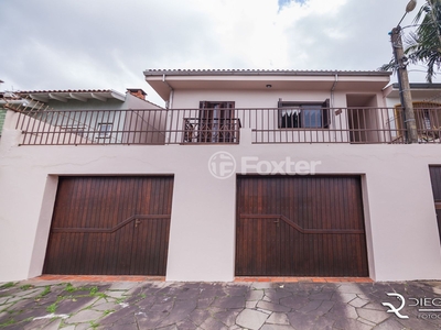 Casa 3 dorms à venda Rua Arnaldo Ballve, Jardim Itu - Porto Alegre