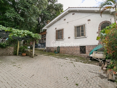 Casa 3 dorms à venda Rua dos Guenoas, Guarujá - Porto Alegre