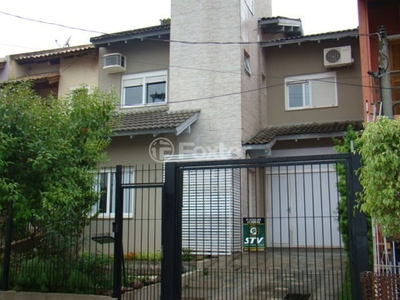 Casa 3 dorms à venda Rua Giobatta Giuseppe Petracco, Vila Nova - Porto Alegre
