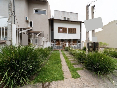 Casa 3 dorms à venda Rua Henrique Anawate, Guarujá - Porto Alegre
