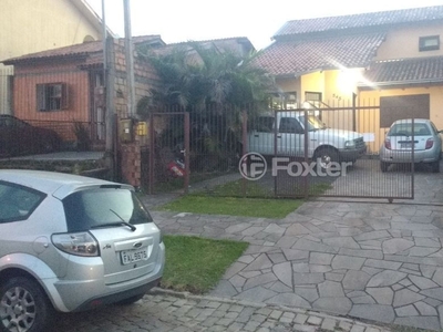 Casa 3 dorms à venda Rua Professora Ziláh Totta, Passo das Pedras - Porto Alegre