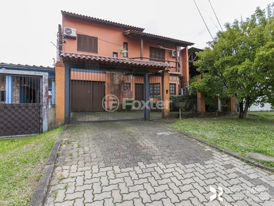 Casa 3 dorms à venda Rua Tomé Antônio de Souza, Campo Novo - Porto Alegre