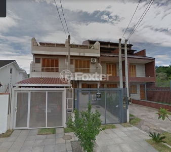 Casa 3 dorms à venda Rua Waldemar da Silva Tavares, Guarujá - Porto Alegre