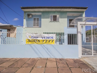 Casa 4 dorms à venda Rua Ângelo Barboza, Cavalhada - Porto Alegre