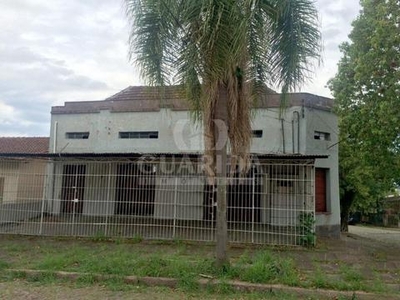 Casa 4 dorms à venda Rua Arnaldo Ballve, Jardim Itu - Porto Alegre