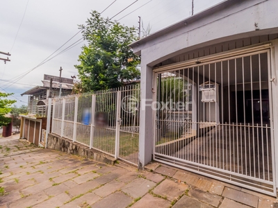 Casa 4 dorms à venda Rua Cláudio Manoel da Costa, Jardim Sabará - Porto Alegre
