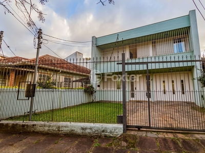 Casa 4 dorms à venda Rua Fagundes Varela, Santo Antônio - Porto Alegre