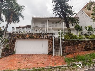 Casa 4 dorms à venda Rua Fernando Osório, Teresópolis - Porto Alegre