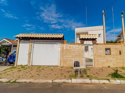 Casa 4 dorms à venda Rua Garruchos, Arquipélago - Porto Alegre