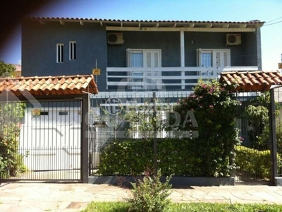 Casa 4 dorms à venda Rua Giruá, Cavalhada - Porto Alegre