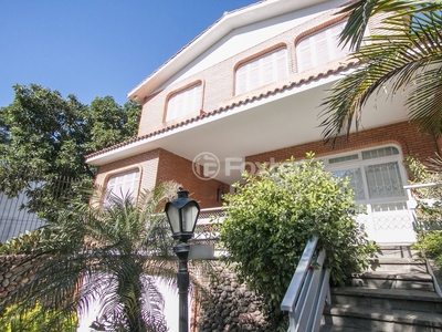 Casa 4 dorms à venda Rua João Paetzel, Chácara das Pedras - Porto Alegre