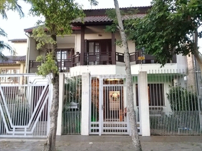 Casa 4 dorms à venda Rua Lola de Oliveira, Parque Santa Fé - Porto Alegre