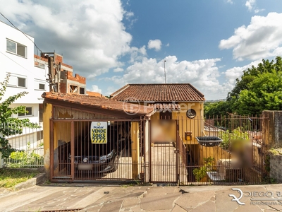 Casa 4 dorms à venda Rua Padre João Batista Reus, Camaquã - Porto Alegre