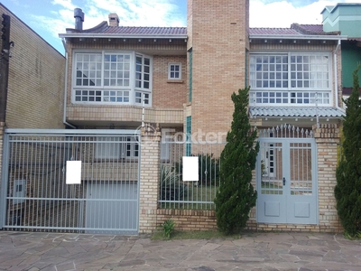 Casa 4 dorms à venda Rua Professora Lucy Maria Soares Santos, Jardim Itu-Sabará - Porto Alegre