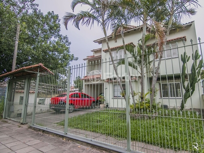 Casa 4 dorms à venda Rua Sílvio Silveira Soares, Camaquã - Porto Alegre