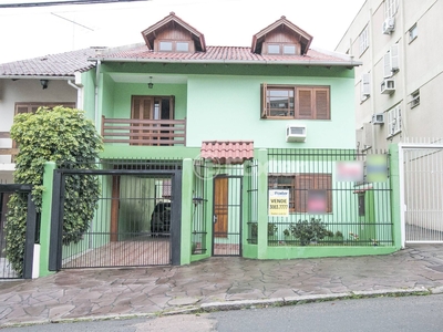 Casa 4 dorms à venda Rua Teixeira de Freitas, Santo Antônio - Porto Alegre