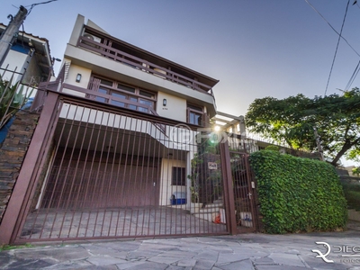 Casa 5 dorms à venda Rua Araponga, Chácara das Pedras - Porto Alegre
