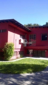 Casa 5 dorms à venda Rua Doutor Possidônio Cunha, Vila Assunção - Porto Alegre