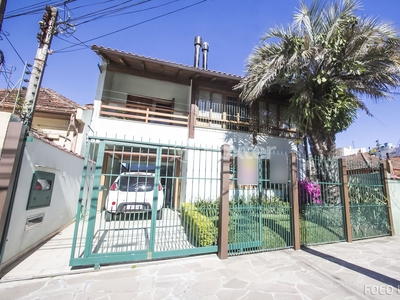 Casa 5 dorms à venda Rua Luiz de Camões, Santo Antônio - Porto Alegre