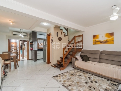 Casa em Condomínio 2 dorms à venda Avenida Edgar Pires de Castro, Hípica - Porto Alegre
