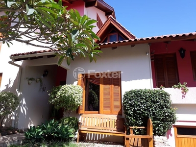 Casa em Condomínio 4 dorms à venda Avenida Vicente Monteggia, Cavalhada - Porto Alegre