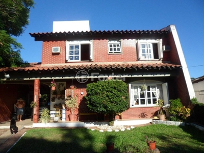 Casa em Condomínio 4 dorms à venda Rua dos Guenoas, Guarujá - Porto Alegre