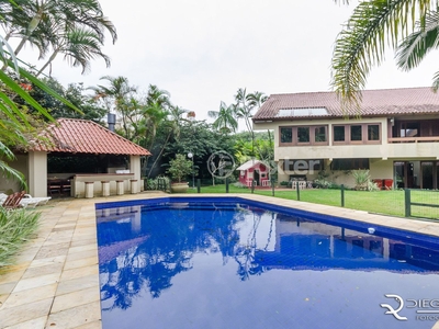 Casa em Condomínio 7 dorms à venda Avenida da Cavalhada, Cavalhada - Porto Alegre