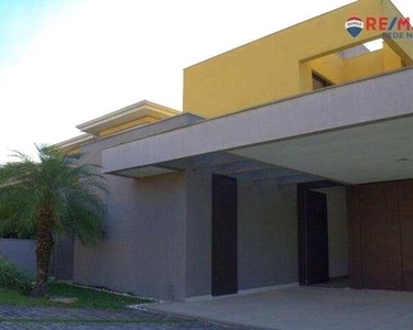 Casa com 3 dormitórios para alugar, 392 m² por R$ 8.269,10/mês - Condomínio Portal de Brag