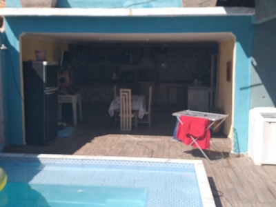 Casa com piscina próximo a prai