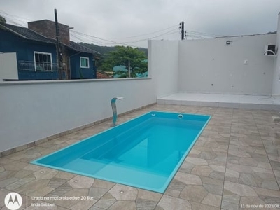 Casa dois dormitórios com piscina