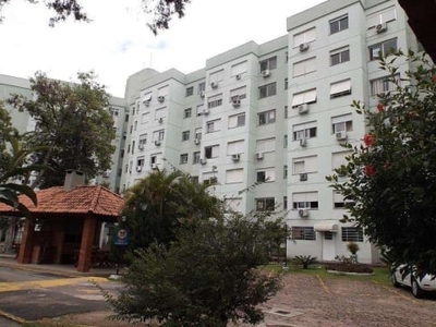 Excelente apto 02 dorm, sala, cozinha mobiliada, banheiro e box escriturada, piso frio/laminado, agua quente.