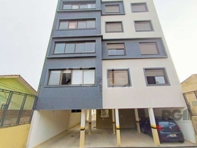 Apartamento para locação no bairro tristeza, com aproximadamente 39m² de área privativa, piso porcelanato/laminado, ótima iluminação natural, 01 dormitório, living, cozinha e área de serviço integrad