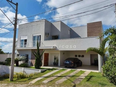 Sobrado com 3 dormitórios, 365 m² - venda por r$ 1.800.000,00 ou aluguel por r$ 13.862,00/mês - condomínio lago dourado - jacareí/sp