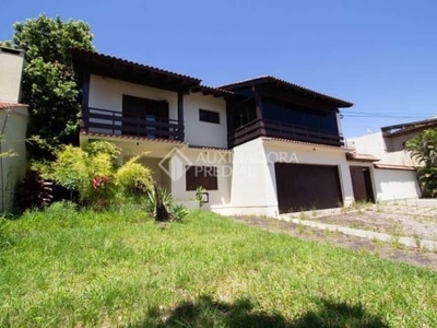 Casa em condomínio fechado com 4 quartos para alugar na avenida saul nonnenmacher, 77, aberta dos morros, porto alegre, 850 m2 por r$ 12.000