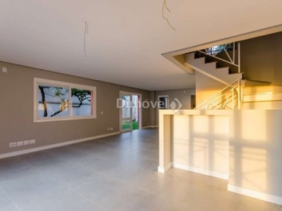 Casa em condomínio fechado com 4 quartos à venda na Avenida Guaíba, 4400, Vila Assunção, Porto Alegre por R$ 1.300.000