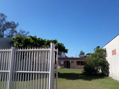 Terreno à venda, 360 m² com casa de 56 m² por R$ 250.000