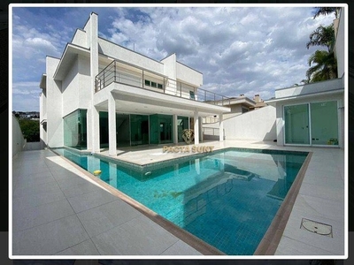 Casa com 4 suítes, piscina, 5 vagas, 536 m² - venda por R$ 5.350.000 ou aluguel por R$ 34.