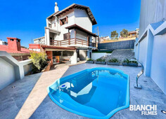 Casa com piscina, 3 dormitórios à venda, 255 m² por R$ 980.000 - Jardim América - Caxias do Sul/RS