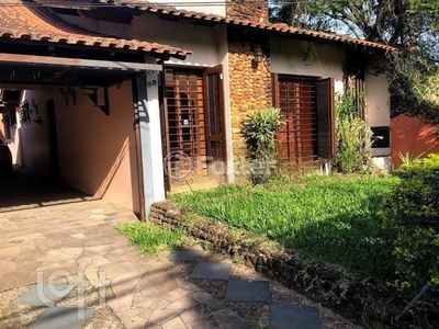 Casa 4 dorms à venda Rua Humberto de Campos, Partenon - Porto Alegre